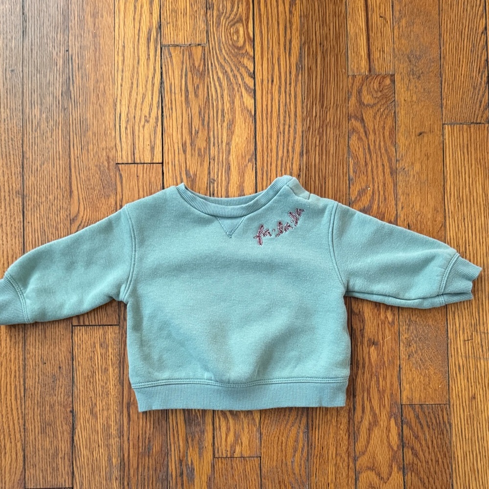 Baby holiday sweatshirt with “falala”Embroidery